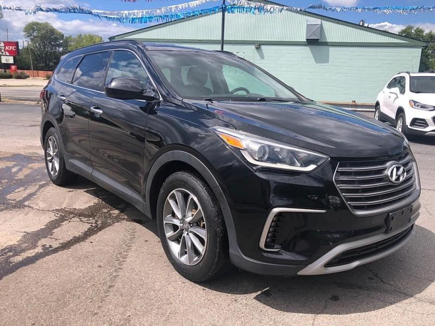2017 BLACK /BLACK Hyundai Santa Fe SE AWD (KM8SMDHF6HU) with an 3.3L V6 DOHC 24V engine, 6A transmission, located at 3304 Woodville Road, Northwood, OH, 43619, (419) 210-8019, 41.612694, -83.480743 - Your #1 Destination for Auto Loans and mdash;No Matter Your Credit!At our dealership, we believe everyone deserves the opportunity to drive their dream car and mdash;whether you have good credit, bad credit, or no credit at all. With a wide selection of hundreds of cars, trucks, and SUVs, you'll fin - Photo#6