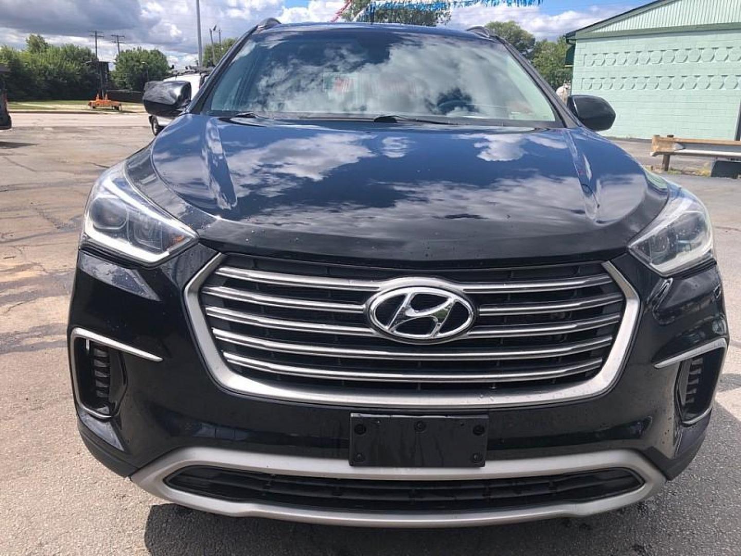 2017 BLACK /BLACK Hyundai Santa Fe SE AWD (KM8SMDHF6HU) with an 3.3L V6 DOHC 24V engine, 6A transmission, located at 3304 Woodville Road, Northwood, OH, 43619, (419) 210-8019, 41.612694, -83.480743 - Your #1 Destination for Auto Loans and mdash;No Matter Your Credit!At our dealership, we believe everyone deserves the opportunity to drive their dream car and mdash;whether you have good credit, bad credit, or no credit at all. With a wide selection of hundreds of cars, trucks, and SUVs, you'll fin - Photo#7