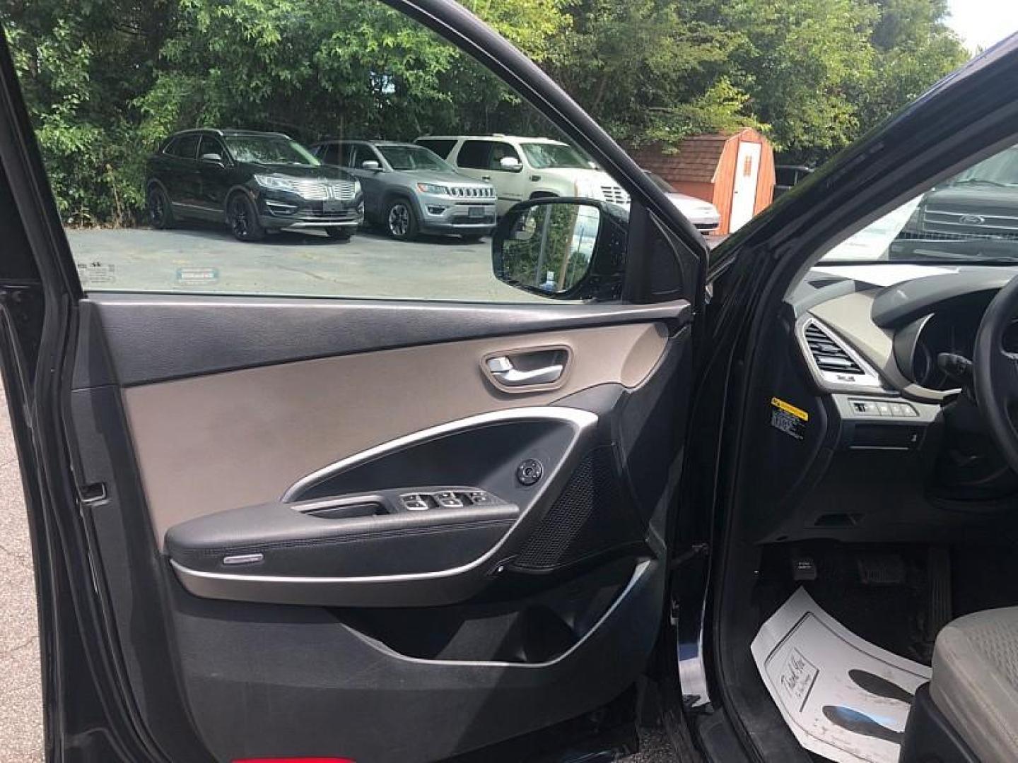 2017 BLACK /BLACK Hyundai Santa Fe SE AWD (KM8SMDHF6HU) with an 3.3L V6 DOHC 24V engine, 6A transmission, located at 3304 Woodville Road, Northwood, OH, 43619, (419) 210-8019, 41.612694, -83.480743 - Your #1 Destination for Auto Loans and mdash;No Matter Your Credit!At our dealership, we believe everyone deserves the opportunity to drive their dream car and mdash;whether you have good credit, bad credit, or no credit at all. With a wide selection of hundreds of cars, trucks, and SUVs, you'll fin - Photo#8