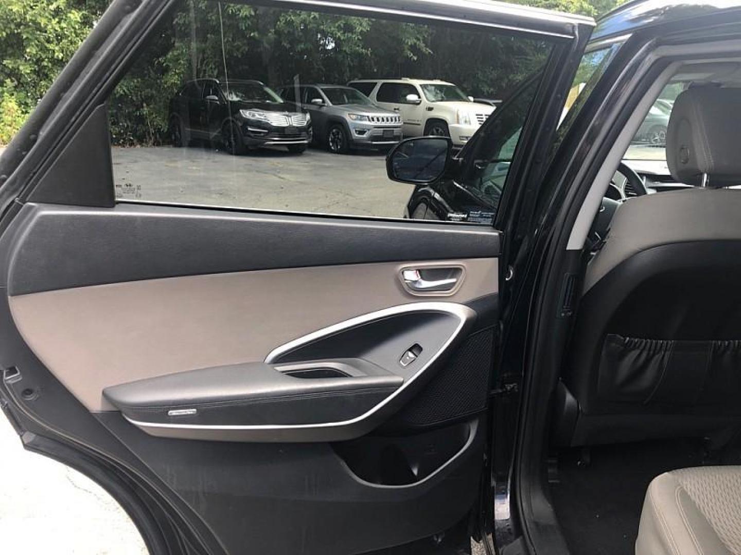 2017 BLACK /BLACK Hyundai Santa Fe SE AWD (KM8SMDHF6HU) with an 3.3L V6 DOHC 24V engine, 6A transmission, located at 3304 Woodville Road, Northwood, OH, 43619, (419) 210-8019, 41.612694, -83.480743 - Your #1 Destination for Auto Loans and mdash;No Matter Your Credit!At our dealership, we believe everyone deserves the opportunity to drive their dream car and mdash;whether you have good credit, bad credit, or no credit at all. With a wide selection of hundreds of cars, trucks, and SUVs, you'll fin - Photo#10