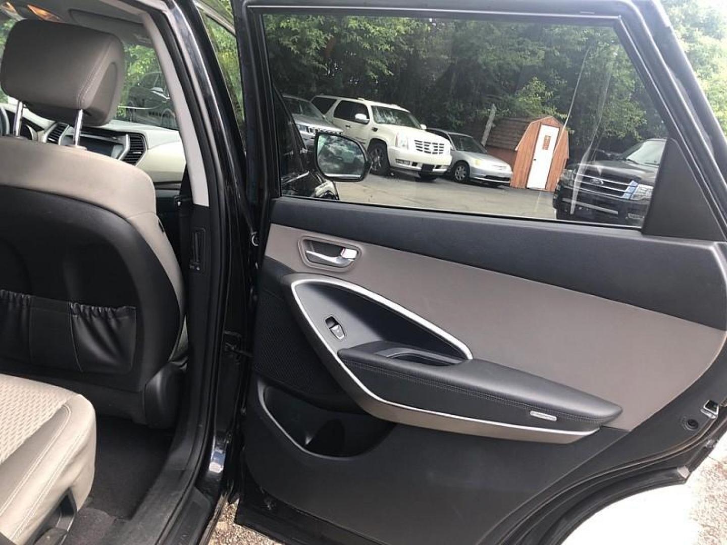 2017 BLACK /BLACK Hyundai Santa Fe SE AWD (KM8SMDHF6HU) with an 3.3L V6 DOHC 24V engine, 6A transmission, located at 3304 Woodville Road, Northwood, OH, 43619, (419) 210-8019, 41.612694, -83.480743 - Your #1 Destination for Auto Loans and mdash;No Matter Your Credit!At our dealership, we believe everyone deserves the opportunity to drive their dream car and mdash;whether you have good credit, bad credit, or no credit at all. With a wide selection of hundreds of cars, trucks, and SUVs, you'll fin - Photo#14