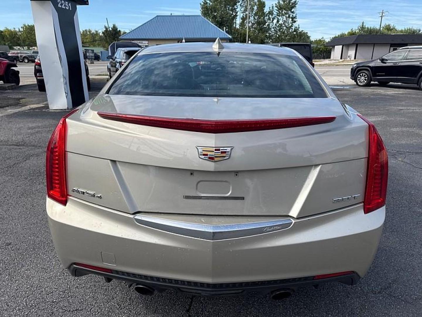 2015 GOLD /BLACK Cadillac ATS 2.0L Turbo Standard AWD (1G6AG5RX7F0) with an 2.0L L4 DOHC 16V TURBO engine, 6-Speed Automatic transmission, located at 3304 Woodville Road, Northwood, OH, 43619, (419) 210-8019, 41.612694, -83.480743 - Your #1 Destination for Auto Loans and mdash;No Matter Your Credit!At our dealership, we believe everyone deserves the opportunity to drive their dream car and mdash;whether you have good credit, bad credit, or no credit at all. With a wide selection of hundreds of cars, trucks, and SUVs, you'll fin - Photo#3