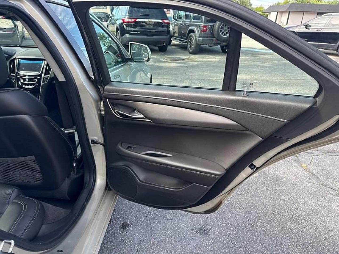 2015 GOLD /BLACK Cadillac ATS 2.0L Turbo Standard AWD (1G6AG5RX7F0) with an 2.0L L4 DOHC 16V TURBO engine, 6-Speed Automatic transmission, located at 3304 Woodville Road, Northwood, OH, 43619, (419) 210-8019, 41.612694, -83.480743 - Your #1 Destination for Auto Loans and mdash;No Matter Your Credit!At our dealership, we believe everyone deserves the opportunity to drive their dream car and mdash;whether you have good credit, bad credit, or no credit at all. With a wide selection of hundreds of cars, trucks, and SUVs, you'll fin - Photo#13