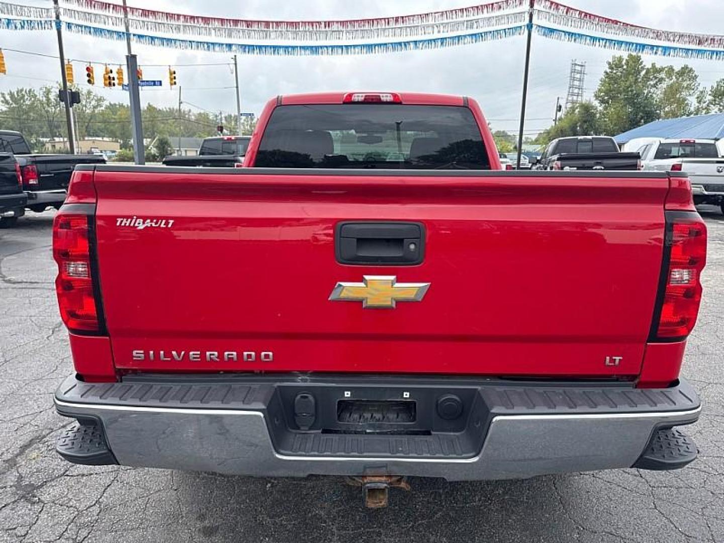 2014 RED /BLACK Chevrolet Silverado 1500 1LT Double Cab 4WD (1GCVKREC7EZ) with an 5.3L V8 OHV 16V engine, 6-Speed Automatic transmission, located at 3304 Woodville Road, Northwood, OH, 43619, (419) 210-8019, 41.612694, -83.480743 - Your #1 Destination for Auto Loans and mdash;No Matter Your Credit!At our dealership, we believe everyone deserves the opportunity to drive their dream car and mdash;whether you have good credit, bad credit, or no credit at all. With a wide selection of hundreds of cars, trucks, and SUVs, you'll fin - Photo#3