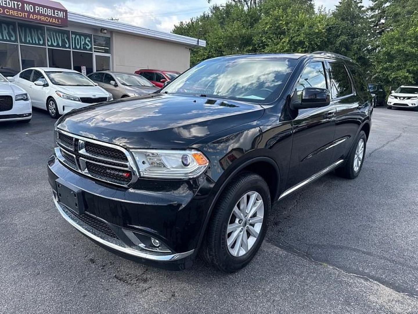 2020 BLACK /TAN Dodge Durango SXT AWD (1C4RDJAG8LC) with an 3.6L V6 DOHC 24V engine, 8A transmission, located at 3304 Woodville Road, Northwood, OH, 43619, (419) 210-8019, 41.612694, -83.480743 - Your #1 Destination for Auto Loans and mdash;No Matter Your Credit!At our dealership, we believe everyone deserves the opportunity to drive their dream car and mdash;whether you have good credit, bad credit, or no credit at all. With a wide selection of hundreds of cars, trucks, and SUVs, you'll fin - Photo#0