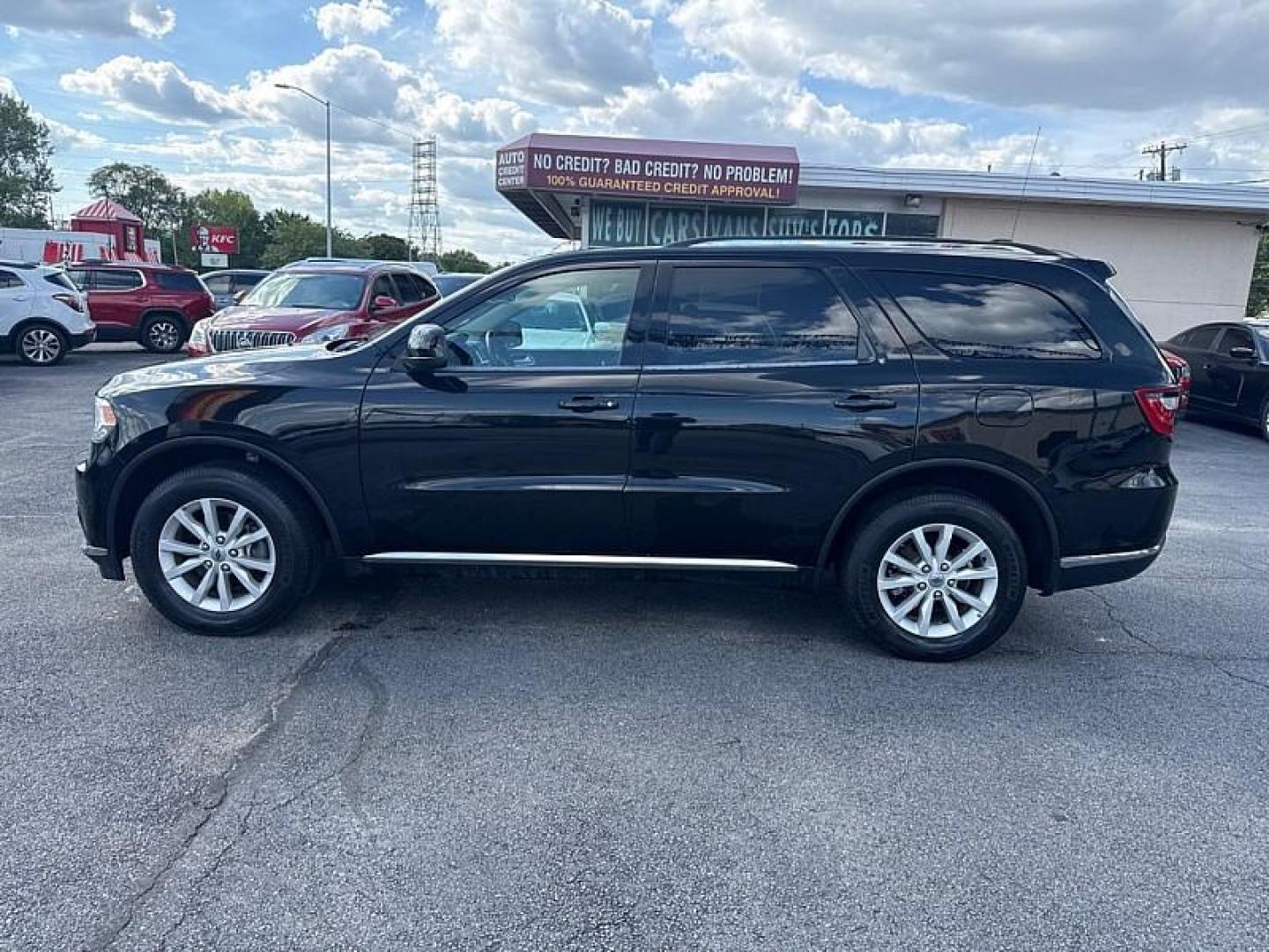 2020 BLACK /TAN Dodge Durango SXT AWD (1C4RDJAG8LC) with an 3.6L V6 DOHC 24V engine, 8A transmission, located at 3304 Woodville Road, Northwood, OH, 43619, (419) 210-8019, 41.612694, -83.480743 - Your #1 Destination for Auto Loans and mdash;No Matter Your Credit!At our dealership, we believe everyone deserves the opportunity to drive their dream car and mdash;whether you have good credit, bad credit, or no credit at all. With a wide selection of hundreds of cars, trucks, and SUVs, you'll fin - Photo#1