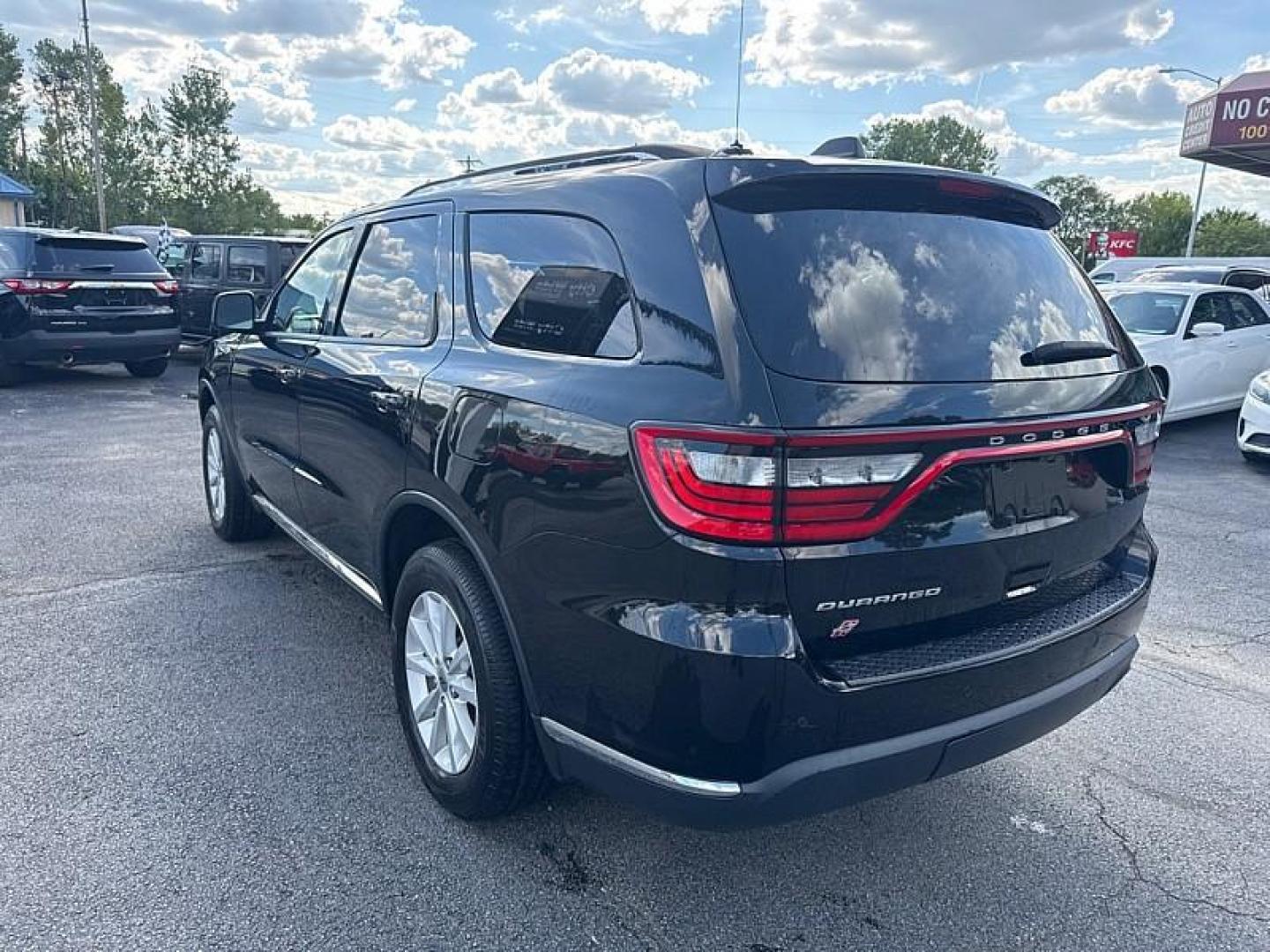 2020 BLACK /TAN Dodge Durango SXT AWD (1C4RDJAG8LC) with an 3.6L V6 DOHC 24V engine, 8A transmission, located at 3304 Woodville Road, Northwood, OH, 43619, (419) 210-8019, 41.612694, -83.480743 - Your #1 Destination for Auto Loans and mdash;No Matter Your Credit!At our dealership, we believe everyone deserves the opportunity to drive their dream car and mdash;whether you have good credit, bad credit, or no credit at all. With a wide selection of hundreds of cars, trucks, and SUVs, you'll fin - Photo#2