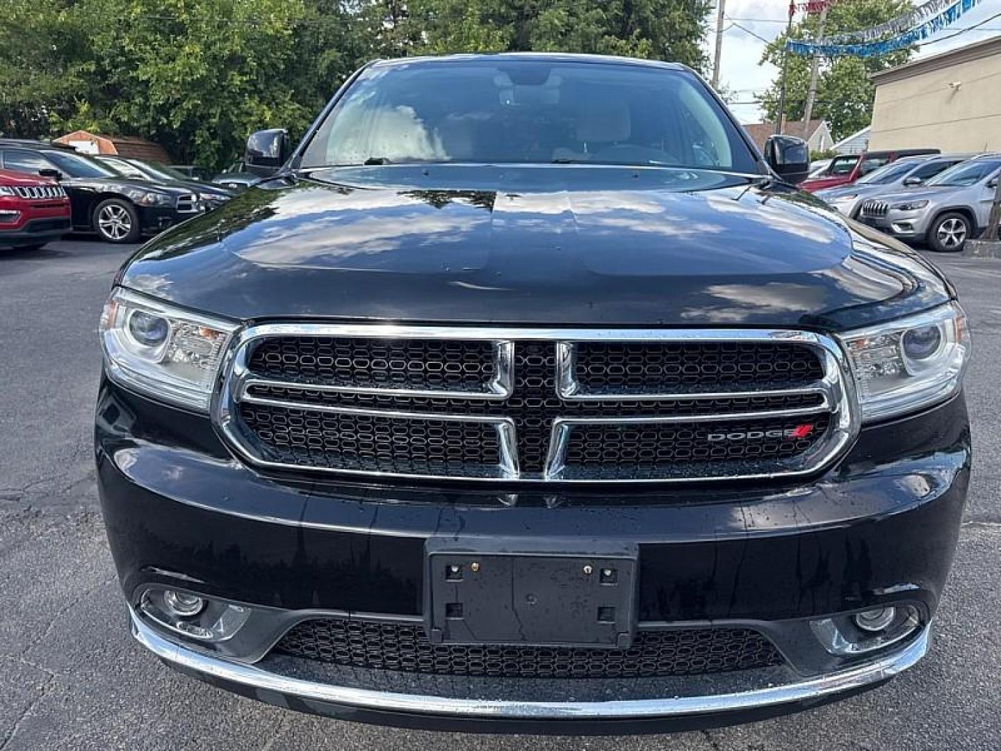 2020 BLACK /TAN Dodge Durango SXT AWD (1C4RDJAG8LC) with an 3.6L V6 DOHC 24V engine, 8A transmission, located at 3304 Woodville Road, Northwood, OH, 43619, (419) 210-8019, 41.612694, -83.480743 - Your #1 Destination for Auto Loans and mdash;No Matter Your Credit!At our dealership, we believe everyone deserves the opportunity to drive their dream car and mdash;whether you have good credit, bad credit, or no credit at all. With a wide selection of hundreds of cars, trucks, and SUVs, you'll fin - Photo#7