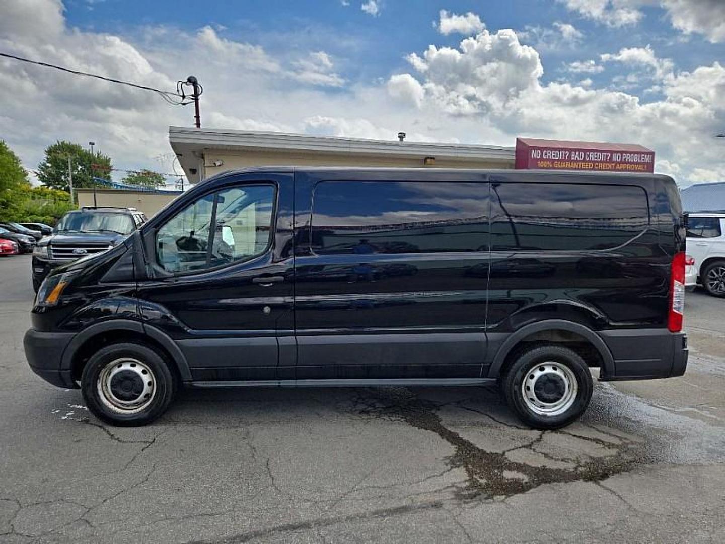 2019 BLACK /GRAY Ford Transit 150 Van Low Roof w/Sliding Pass. 130-in. WB (1FTYE1YM0KK) with an 3.7L V6 DOHC 24V engine, 6A transmission, located at 3304 Woodville Road, Northwood, OH, 43619, (419) 210-8019, 41.612694, -83.480743 - Your #1 Destination for Auto Loans and mdash;No Matter Your Credit!At our dealership, we believe everyone deserves the opportunity to drive their dream car and mdash;whether you have good credit, bad credit, or no credit at all. With a wide selection of hundreds of cars, trucks, and SUVs, you'll fin - Photo#1
