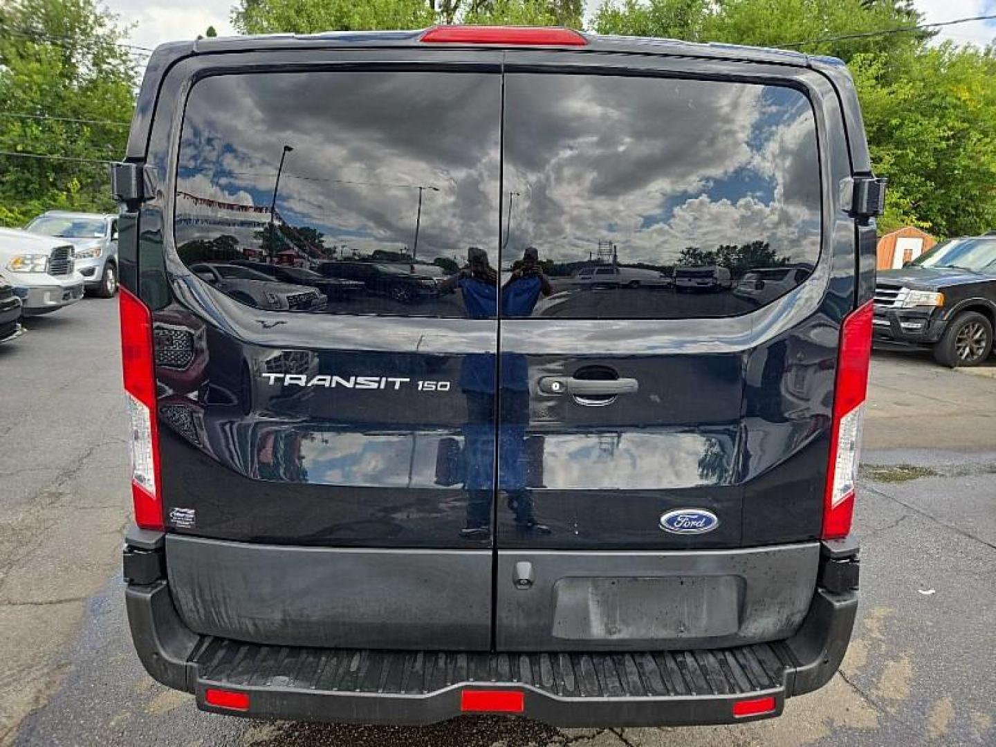 2019 BLACK /GRAY Ford Transit 150 Van Low Roof w/Sliding Pass. 130-in. WB (1FTYE1YM0KK) with an 3.7L V6 DOHC 24V engine, 6A transmission, located at 3304 Woodville Road, Northwood, OH, 43619, (419) 210-8019, 41.612694, -83.480743 - Your #1 Destination for Auto Loans and mdash;No Matter Your Credit!At our dealership, we believe everyone deserves the opportunity to drive their dream car and mdash;whether you have good credit, bad credit, or no credit at all. With a wide selection of hundreds of cars, trucks, and SUVs, you'll fin - Photo#3