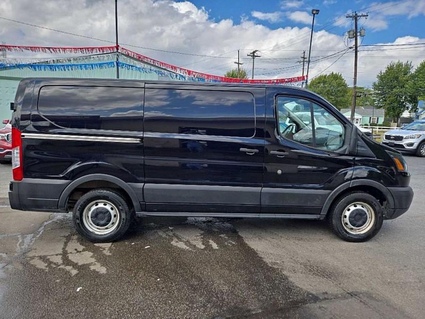 2019 BLACK /GRAY Ford Transit 150 Van Low Roof w/Sliding Pass. 130-in. WB (1FTYE1YM0KK) with an 3.7L V6 DOHC 24V engine, 6A transmission, located at 3304 Woodville Road, Northwood, OH, 43619, (419) 210-8019, 41.612694, -83.480743 - Your #1 Destination for Auto Loans and mdash;No Matter Your Credit!At our dealership, we believe everyone deserves the opportunity to drive their dream car and mdash;whether you have good credit, bad credit, or no credit at all. With a wide selection of hundreds of cars, trucks, and SUVs, you'll fin - Photo#5