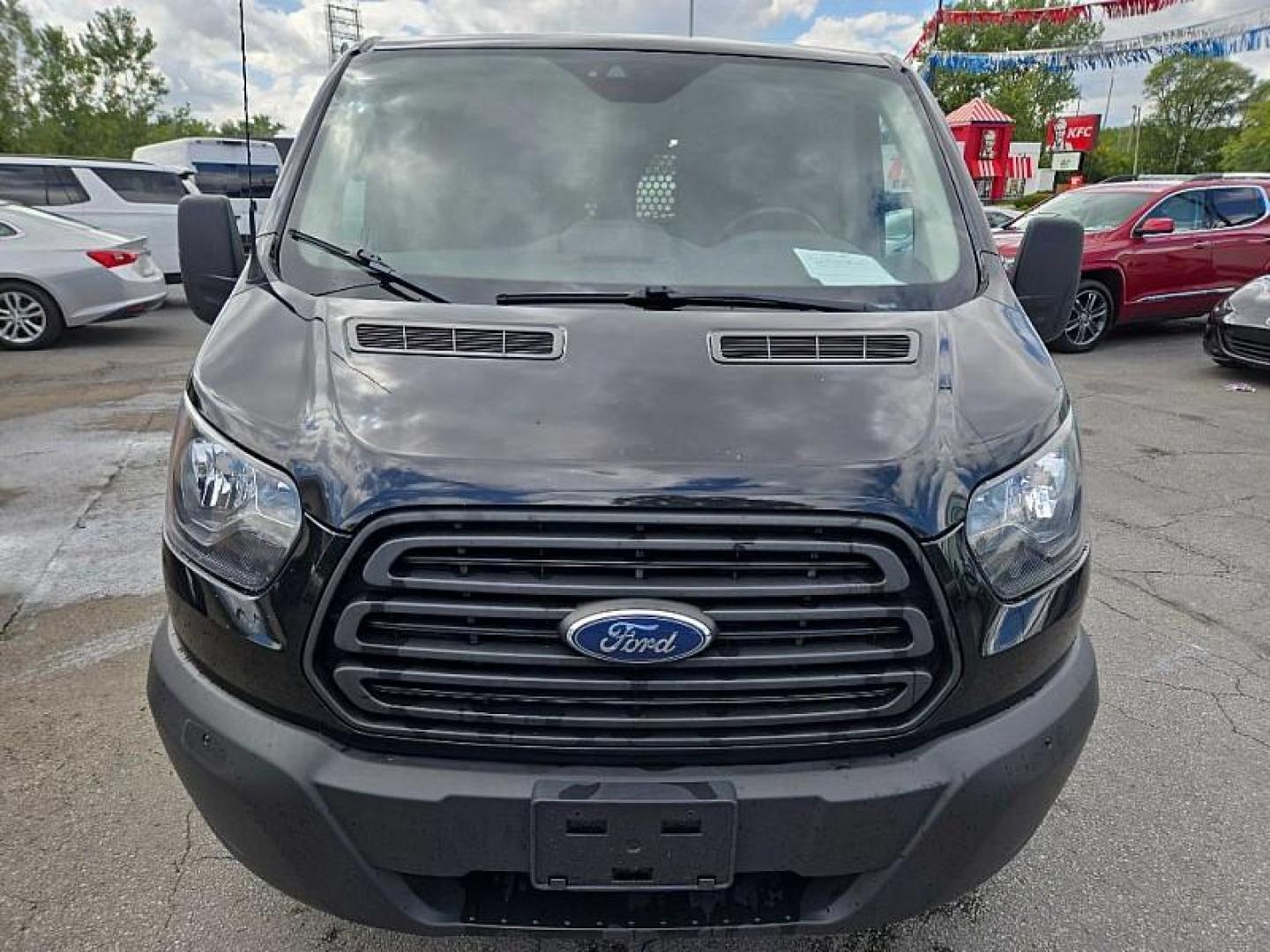 2019 BLACK /GRAY Ford Transit 150 Van Low Roof w/Sliding Pass. 130-in. WB (1FTYE1YM0KK) with an 3.7L V6 DOHC 24V engine, 6A transmission, located at 3304 Woodville Road, Northwood, OH, 43619, (419) 210-8019, 41.612694, -83.480743 - Your #1 Destination for Auto Loans and mdash;No Matter Your Credit!At our dealership, we believe everyone deserves the opportunity to drive their dream car and mdash;whether you have good credit, bad credit, or no credit at all. With a wide selection of hundreds of cars, trucks, and SUVs, you'll fin - Photo#7