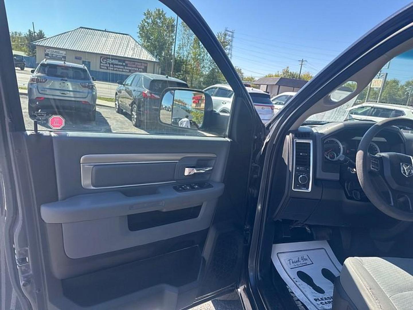 2018 GRAY RAM 1500 SLT Quad Cab 4WD (1C6RR7GM1JS) with an 3.0L V6 DOHC 24V DIESEL engine, 8A transmission, located at 3304 Woodville Road, Northwood, OH, 43619, (419) 210-8019, 41.612694, -83.480743 - Photo#8