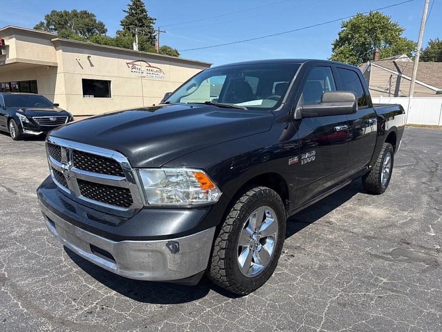 2016 BLACK /BLACK RAM 1500 SLT Crew Cab SWB 4WD (1C6RR7LT5GS) with an 5.7L V8 OHV 16V engine, 6A transmission, located at 3304 Woodville Road, Northwood, OH, 43619, (419) 210-8019, 41.612694, -83.480743 - Photo#0