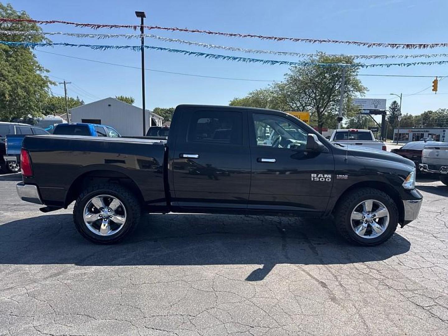 2016 BLACK /BLACK RAM 1500 SLT Crew Cab SWB 4WD (1C6RR7LT5GS) with an 5.7L V8 OHV 16V engine, 6A transmission, located at 3304 Woodville Road, Northwood, OH, 43619, (419) 210-8019, 41.612694, -83.480743 - Photo#5