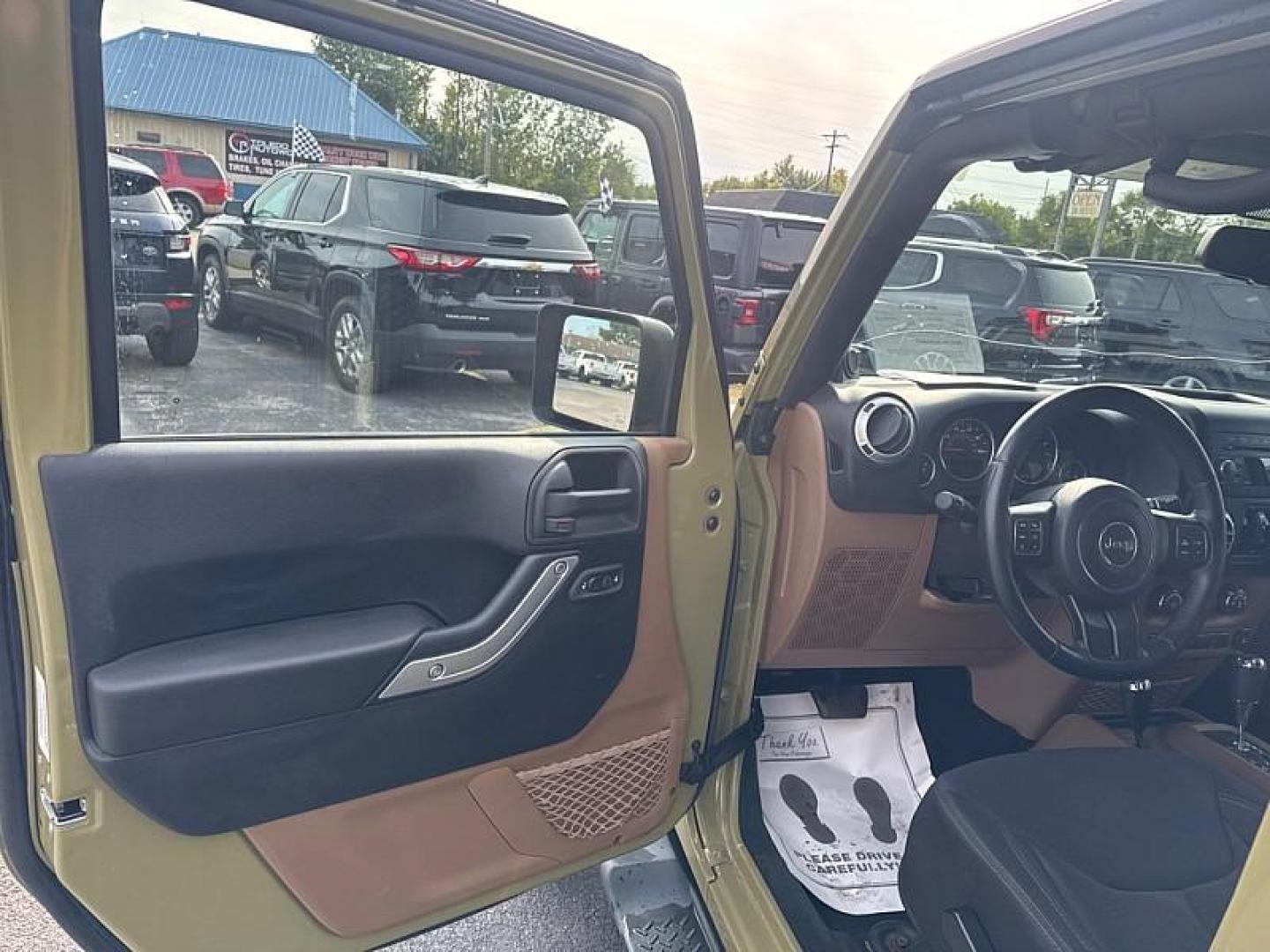 2013 GREEN /BLACK Jeep Wrangler Unlimited Sahara 4WD (1C4BJWEG0DL) with an 3.6L V6 DOHC 24V FFV engine, Automatic 5-Spd transmission, located at 3304 Woodville Road, Northwood, OH, 43619, (419) 210-8019, 41.612694, -83.480743 - Your #1 Destination for Auto Loans and mdash;No Matter Your Credit!At our dealership, we believe everyone deserves the opportunity to drive their dream car and mdash;whether you have good credit, bad credit, or no credit at all. With a wide selection of hundreds of cars, trucks, and SUVs, you'll fin - Photo#8