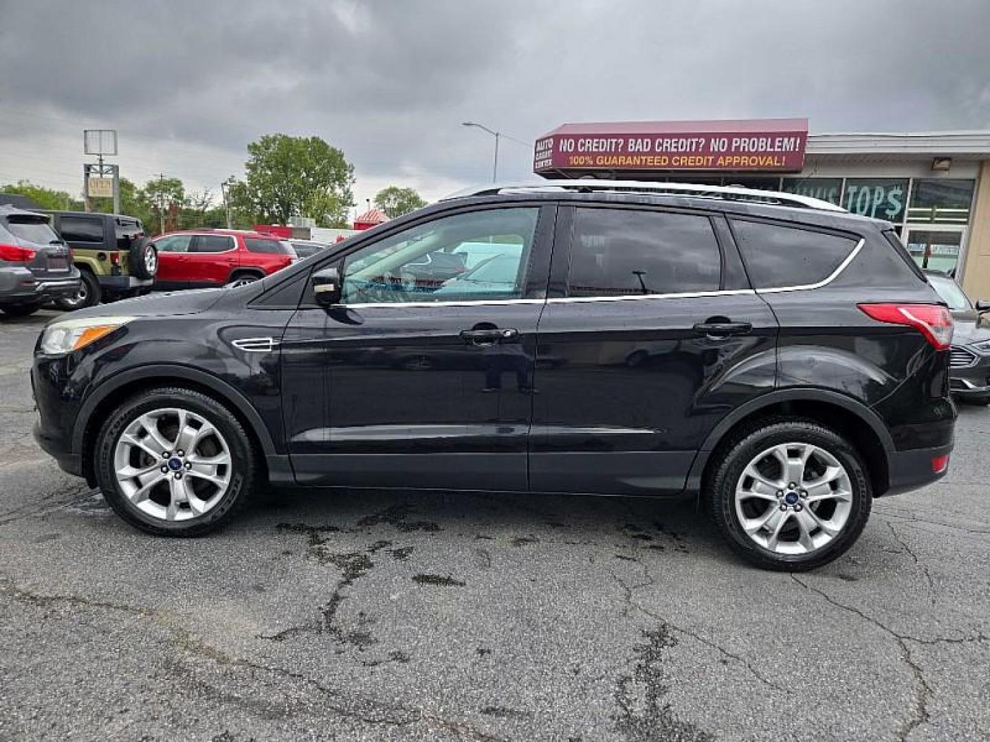 2014 BLACK /BLACK Ford Escape Titanium FWD (1FMCU0J9XEU) with an 2.0L L4 DOHC 16V engine, 6-Speed Automatic transmission, located at 3304 Woodville Road, Northwood, OH, 43619, (419) 210-8019, 41.612694, -83.480743 - Photo#1