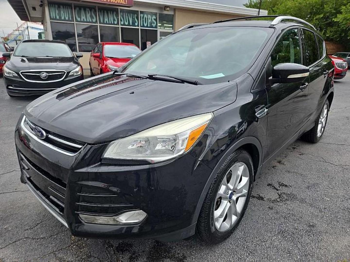 2014 BLACK /BLACK Ford Escape Titanium FWD (1FMCU0J9XEU) with an 2.0L L4 DOHC 16V engine, 6-Speed Automatic transmission, located at 3304 Woodville Road, Northwood, OH, 43619, (419) 210-8019, 41.612694, -83.480743 - Photo#0
