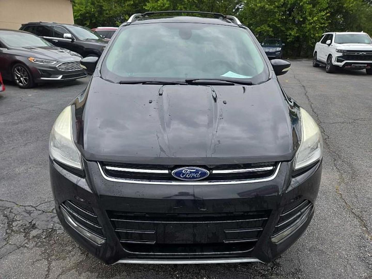 2014 BLACK /BLACK Ford Escape Titanium FWD (1FMCU0J9XEU) with an 2.0L L4 DOHC 16V engine, 6-Speed Automatic transmission, located at 3304 Woodville Road, Northwood, OH, 43619, (419) 210-8019, 41.612694, -83.480743 - Photo#7