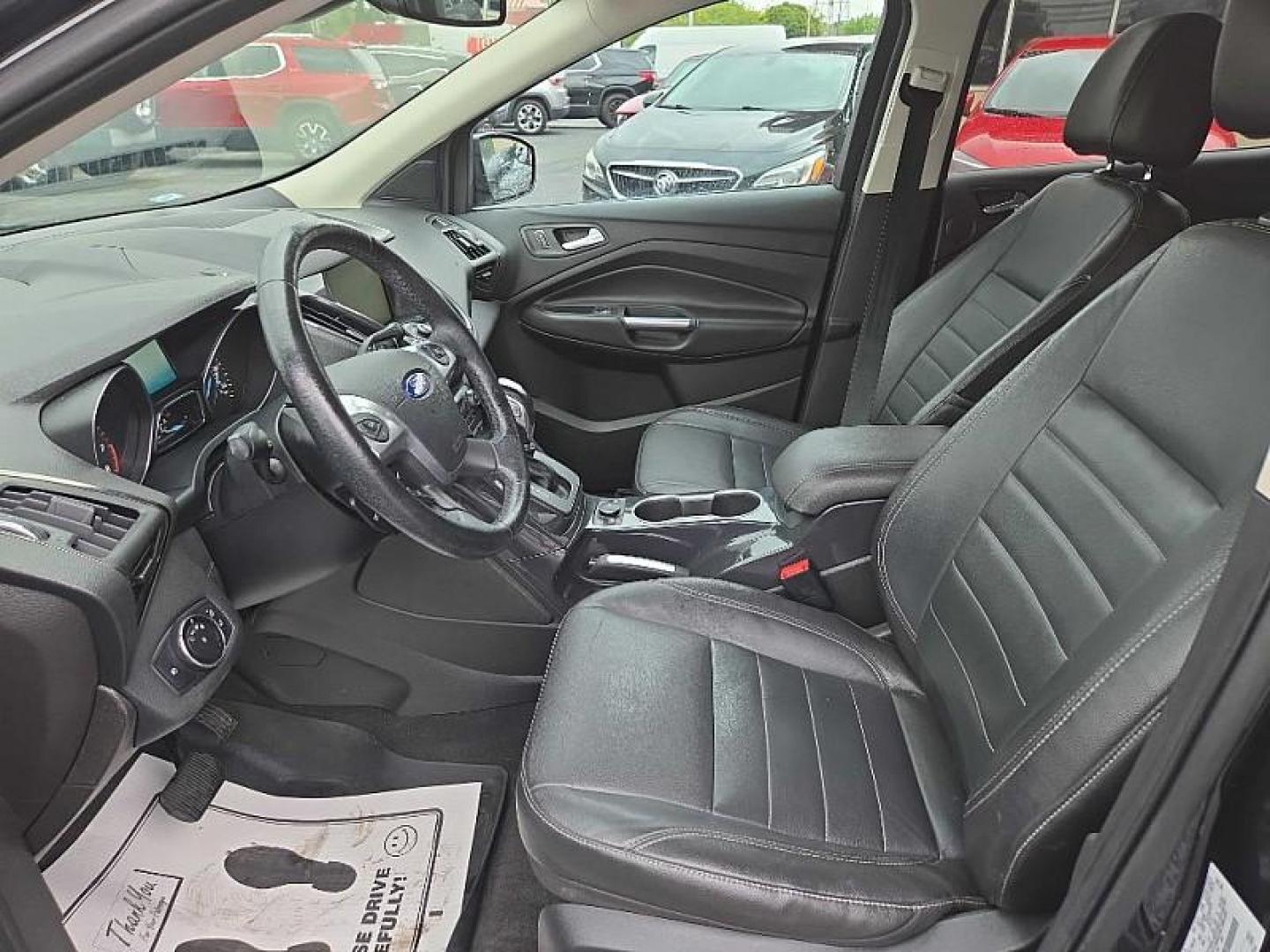 2014 BLACK /BLACK Ford Escape Titanium FWD (1FMCU0J9XEU) with an 2.0L L4 DOHC 16V engine, 6-Speed Automatic transmission, located at 3304 Woodville Road, Northwood, OH, 43619, (419) 210-8019, 41.612694, -83.480743 - Photo#9