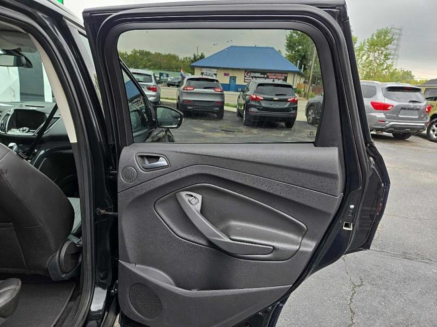 2014 BLACK /BLACK Ford Escape Titanium FWD (1FMCU0J9XEU) with an 2.0L L4 DOHC 16V engine, 6-Speed Automatic transmission, located at 3304 Woodville Road, Northwood, OH, 43619, (419) 210-8019, 41.612694, -83.480743 - Photo#13