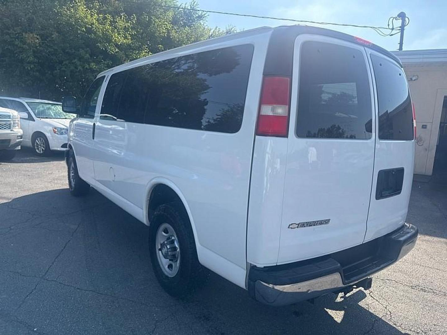 2013 WHITE /BLACK Chevrolet Express LT 3500 (1GAZGYFG7D1) with an 6.0L V8 OHV 16V FFV engine, 6-Speed Automatic transmission, located at 3304 Woodville Road, Northwood, OH, 43619, (419) 210-8019, 41.612694, -83.480743 - Photo#2