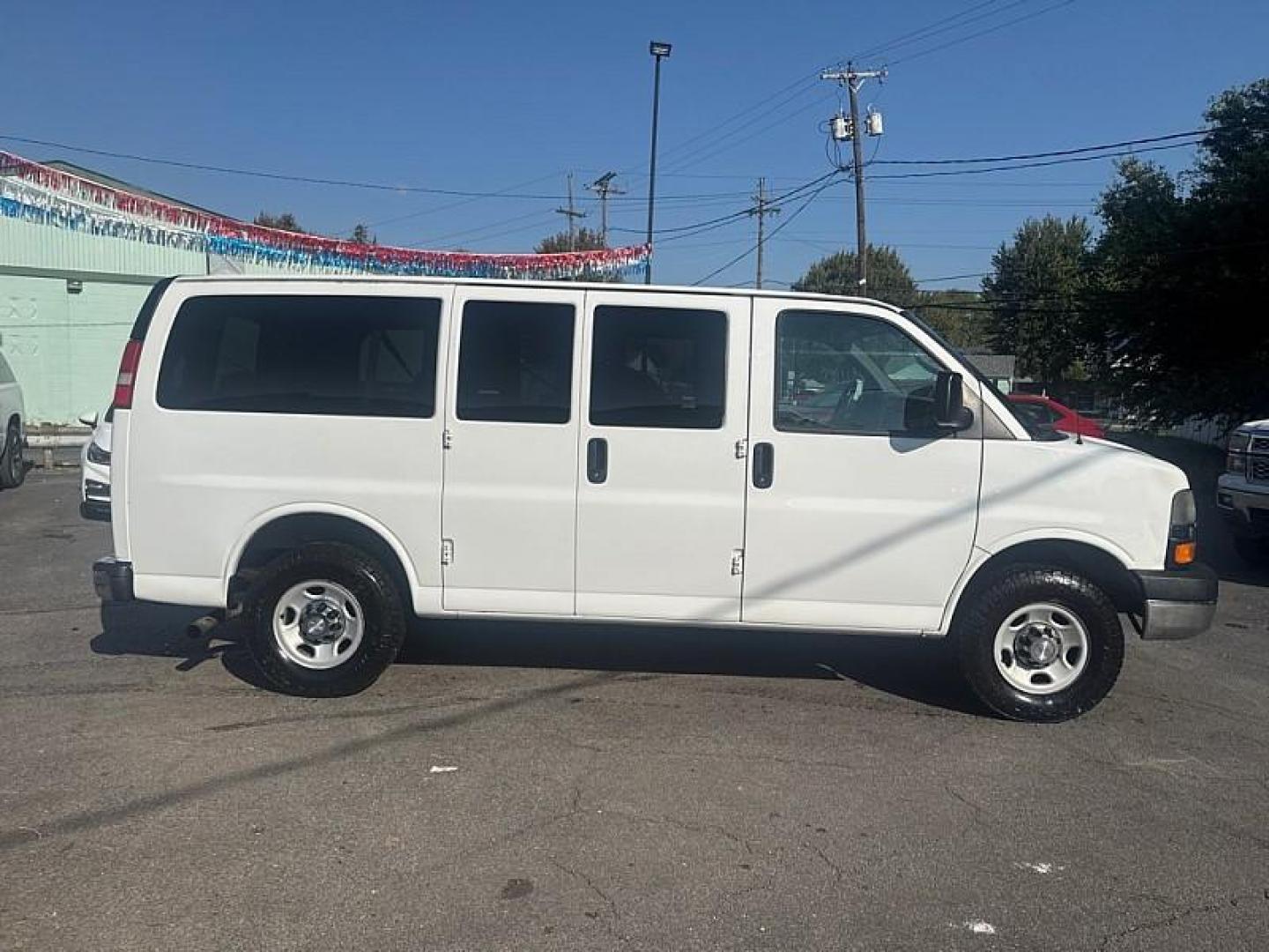 2013 WHITE /BLACK Chevrolet Express LT 3500 (1GAZGYFG7D1) with an 6.0L V8 OHV 16V FFV engine, 6-Speed Automatic transmission, located at 3304 Woodville Road, Northwood, OH, 43619, (419) 210-8019, 41.612694, -83.480743 - Photo#5