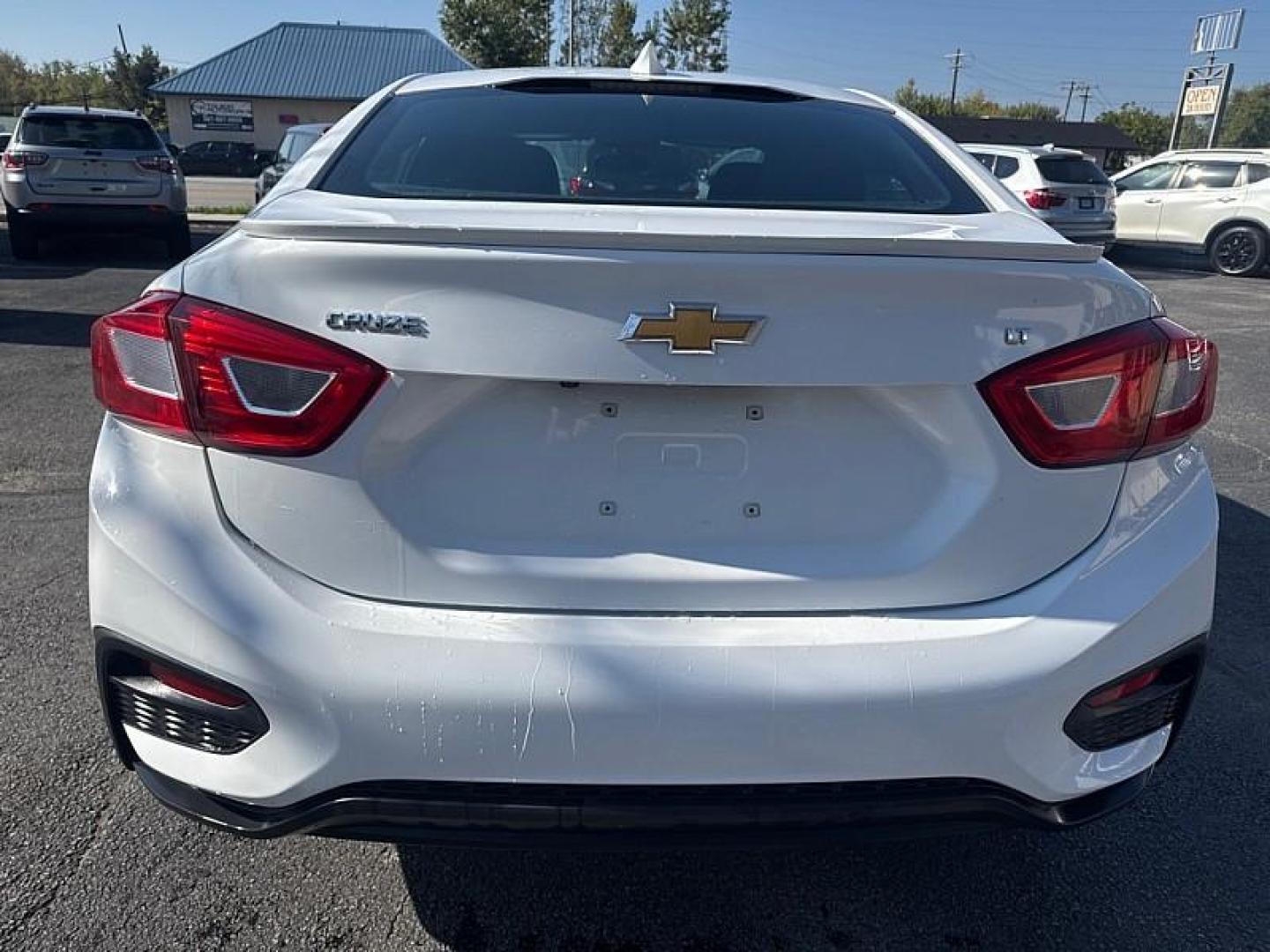 2018 WHITE /BLACK Chevrolet Cruze LT Auto (1G1BE5SM8J7) with an 1.4L L4 DOHC 16V TURBO engine, 6A transmission, located at 3304 Woodville Road, Northwood, OH, 43619, (419) 210-8019, 41.612694, -83.480743 - Photo#3