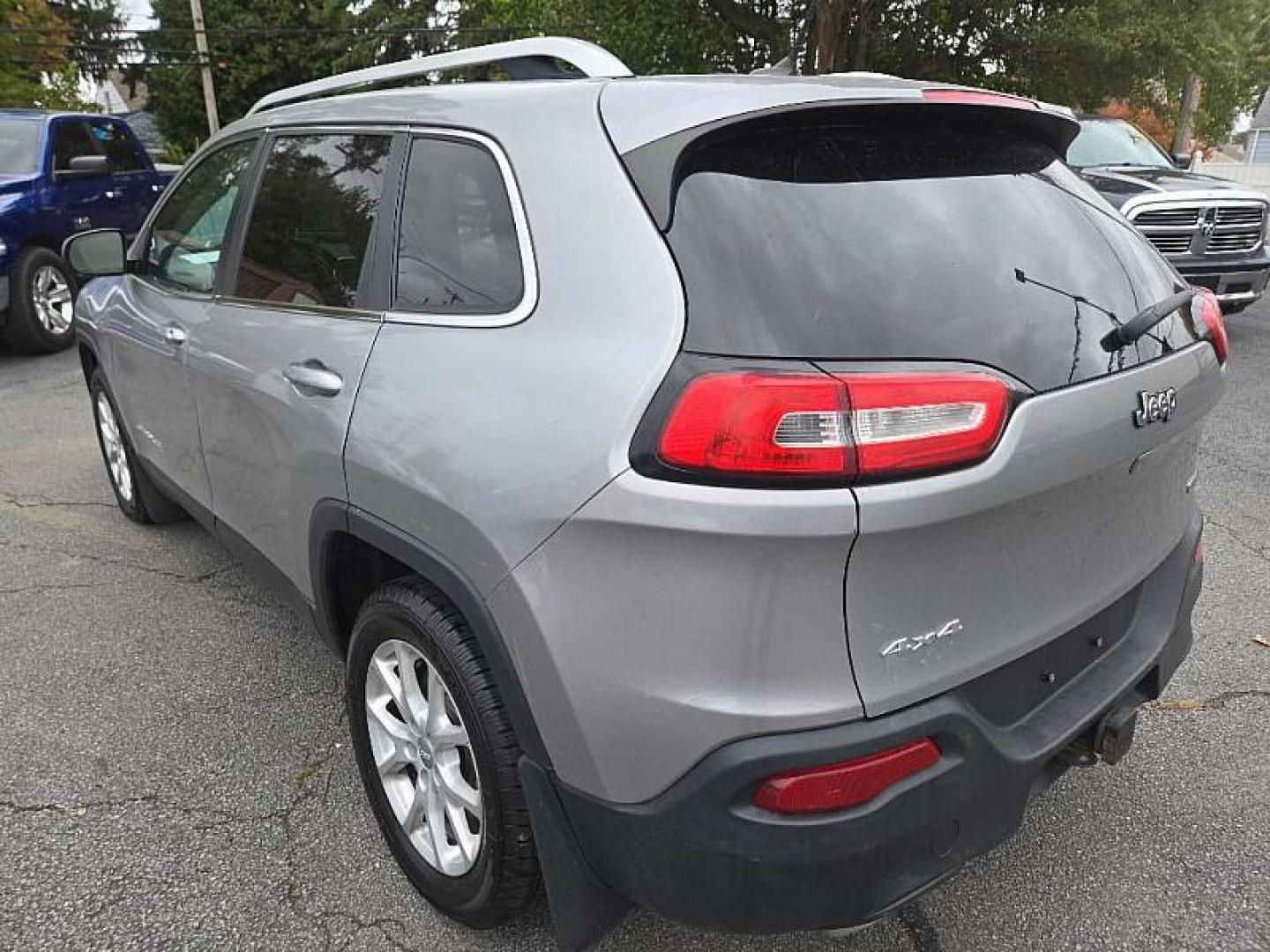 2015 SILVER Jeep Cherokee Latitude 4WD (1C4PJMCS8FW) with an 3.2L V6 DOHC 24V engine, 9-Speed Automatic transmission, located at 3304 Woodville Road, Northwood, OH, 43619, (419) 210-8019, 41.612694, -83.480743 - Your #1 Destination for Auto Loans and mdash;No Matter Your Credit!At our dealership, we believe everyone deserves the opportunity to drive their dream car and mdash;whether you have good credit, bad credit, or no credit at all. With a wide selection of hundreds of cars, trucks, and SUVs, you'll fin - Photo#1