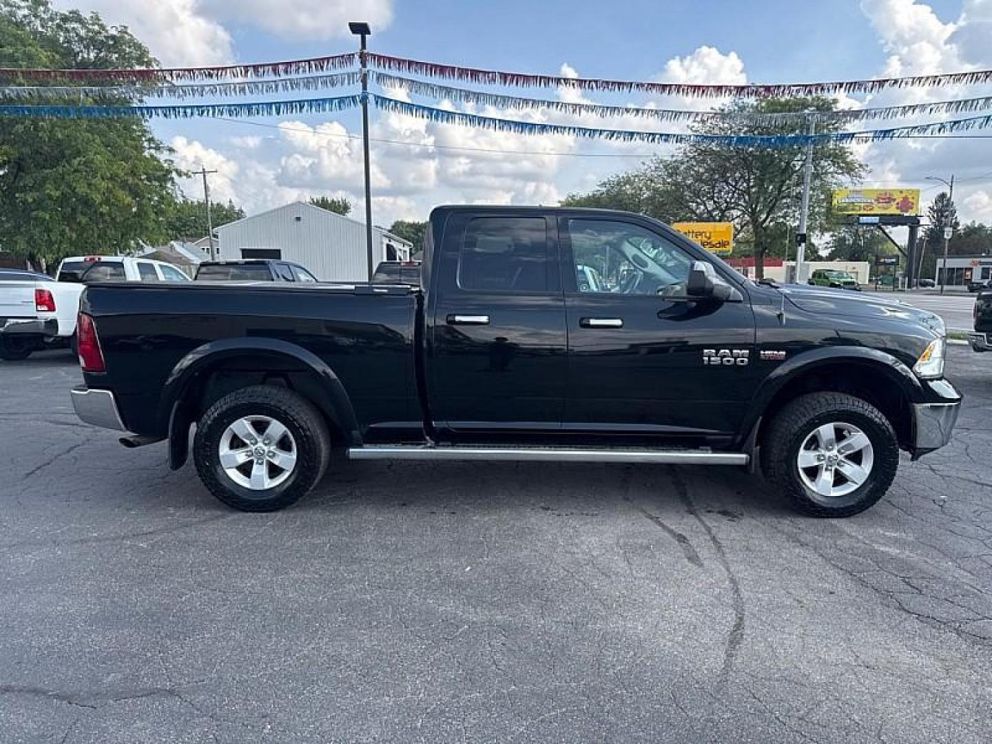 2014 BLACK /BLACK/GRAY RAM 1500 SLT Quad Cab 4WD (1C6RR7GT3ES) with an 5.7L V8 OHV 16V engine, 6-Speed Automatic transmission, located at 3304 Woodville Road, Northwood, OH, 43619, (419) 210-8019, 41.612694, -83.480743 - Photo#5
