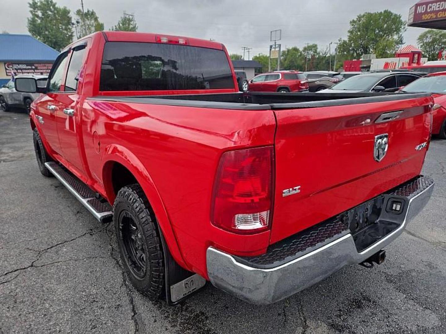 2014 RED /GRAY RAM 1500 Tradesman Quad Cab 4WD (1C6RR7FT3ES) with an 5.7L V8 OHV 16V engine, 6-Speed Automatic transmission, located at 3304 Woodville Road, Northwood, OH, 43619, (419) 210-8019, 41.612694, -83.480743 - Photo#2