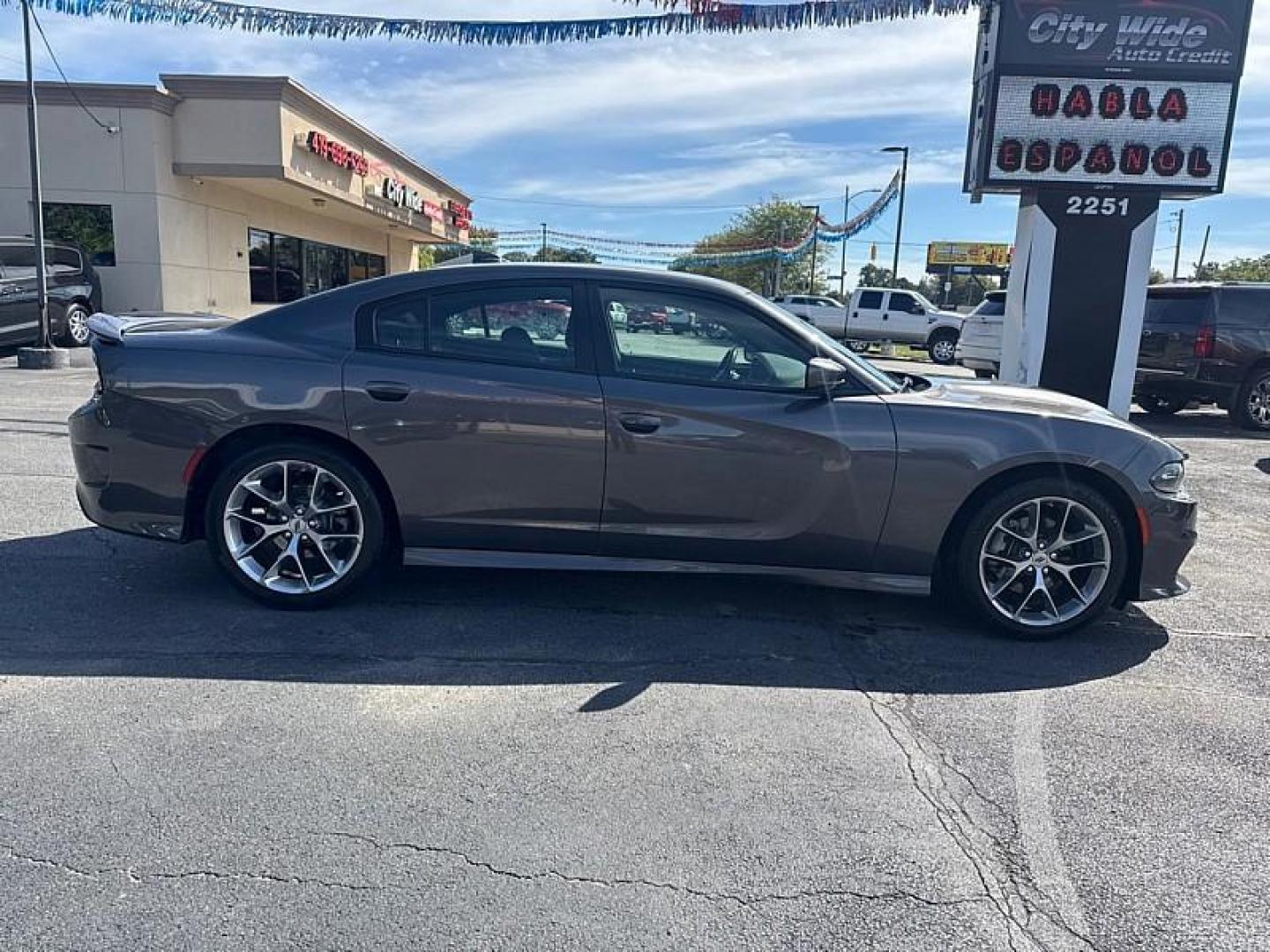 2022 GRAY /BLACK Dodge Charger GT (2C3CDXHGXNH) with an 3.6L V6 DOHC 24V engine, 8A transmission, located at 3304 Woodville Road, Northwood, OH, 43619, (419) 210-8019, 41.612694, -83.480743 - Your #1 Destination for Auto Loans and mdash;No Matter Your Credit!At our dealership, we believe everyone deserves the opportunity to drive their dream car and mdash;whether you have good credit, bad credit, or no credit at all. With a wide selection of hundreds of cars, trucks, and SUVs, you'll fin - Photo#5