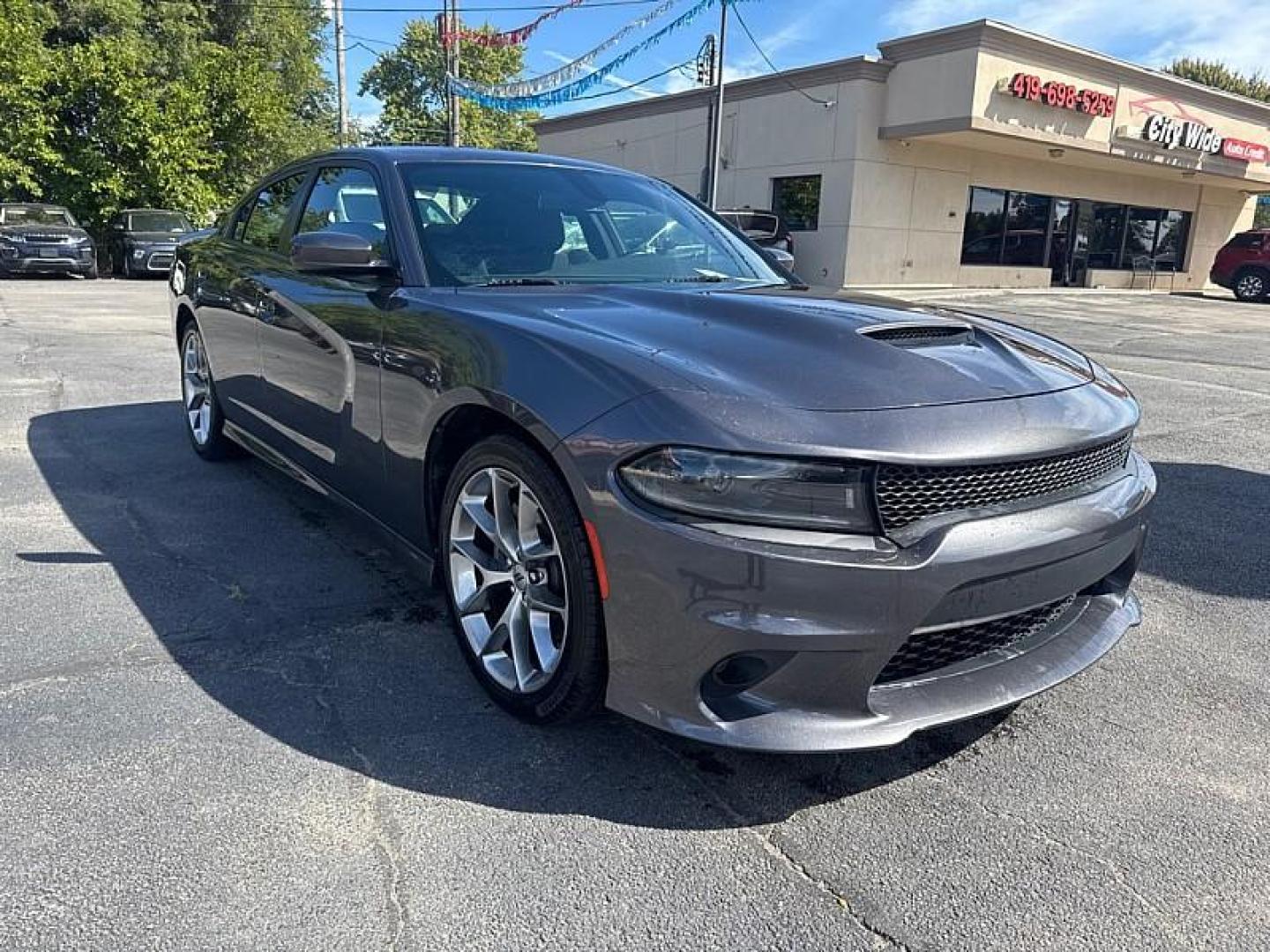 2022 GRAY /BLACK Dodge Charger GT (2C3CDXHGXNH) with an 3.6L V6 DOHC 24V engine, 8A transmission, located at 3304 Woodville Road, Northwood, OH, 43619, (419) 210-8019, 41.612694, -83.480743 - Your #1 Destination for Auto Loans and mdash;No Matter Your Credit!At our dealership, we believe everyone deserves the opportunity to drive their dream car and mdash;whether you have good credit, bad credit, or no credit at all. With a wide selection of hundreds of cars, trucks, and SUVs, you'll fin - Photo#6