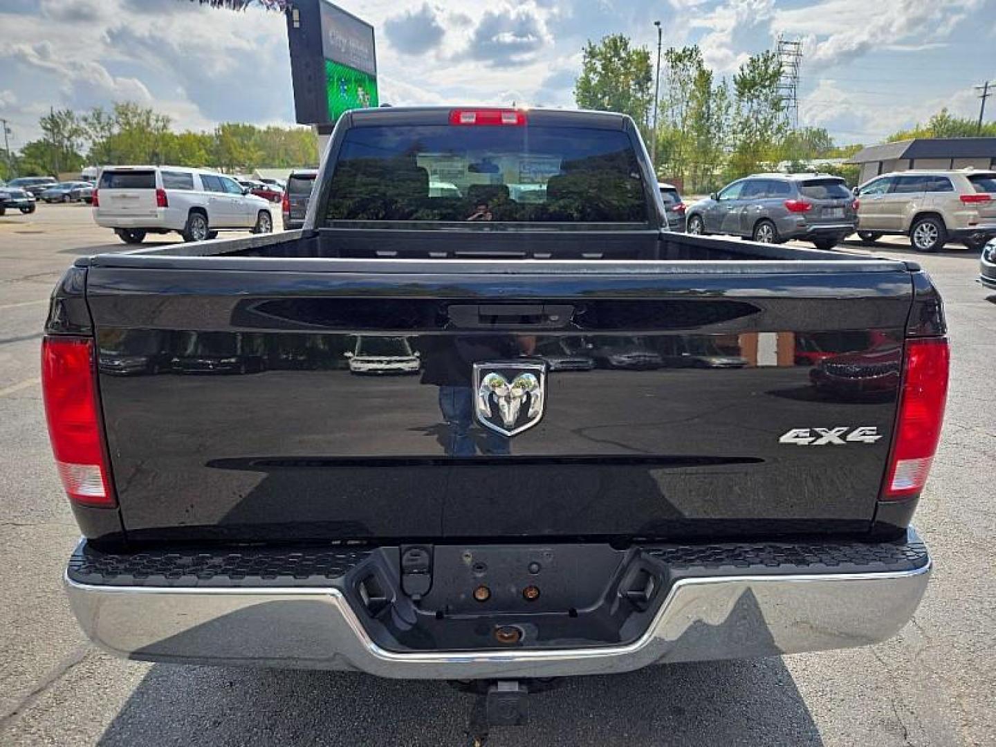 2017 BLACK /GRAY RAM 1500 Tradesman Quad Cab 4WD (1C6RR7FT0HS) with an 5.7L V8 OHV 16V engine, 8A transmission, located at 3304 Woodville Road, Northwood, OH, 43619, (419) 210-8019, 41.612694, -83.480743 - Photo#1