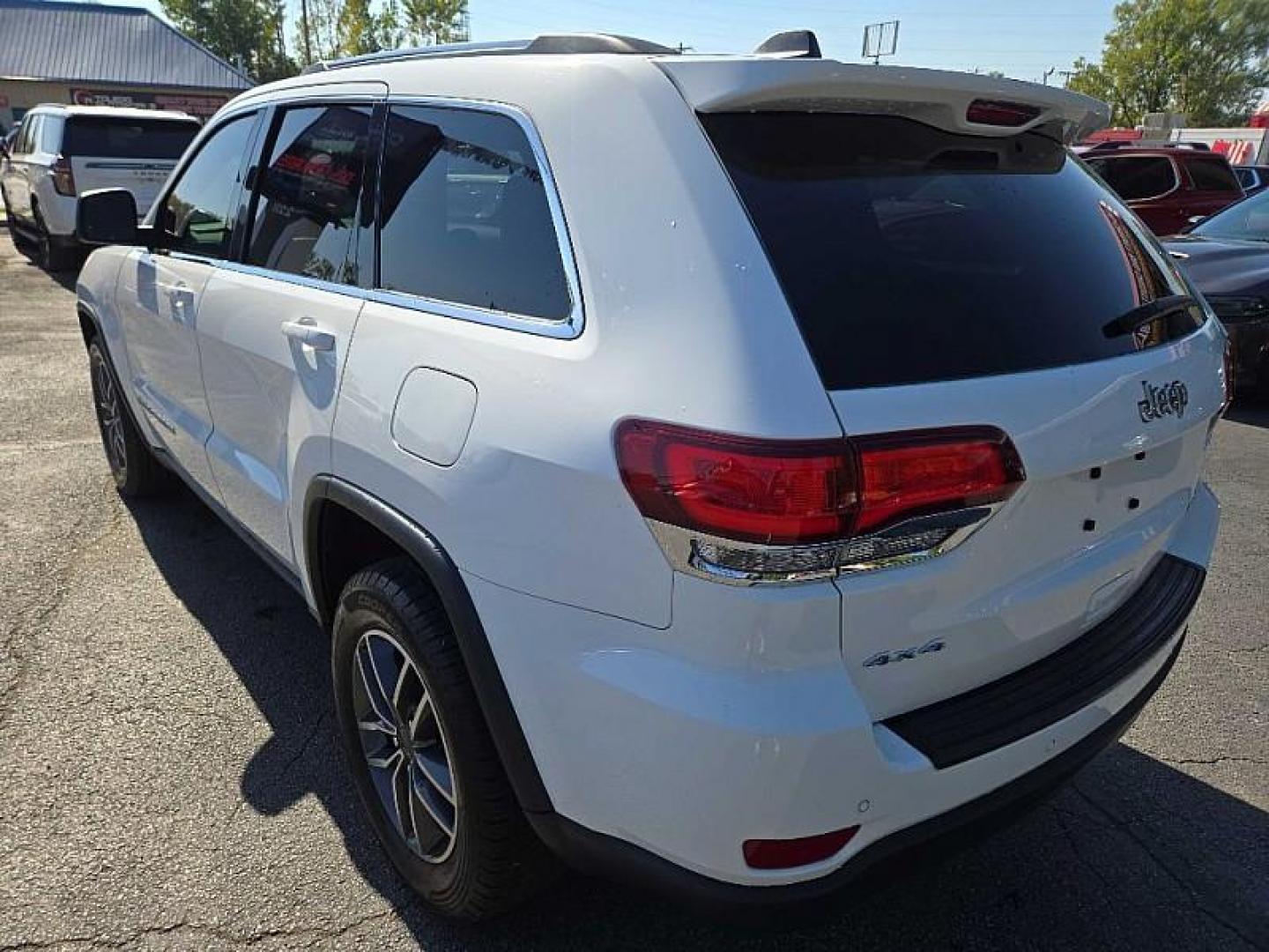 2020 WHITE /BLACK Jeep Grand Cherokee Laredo 4WD (1C4RJFAG9LC) with an 3.6L V6 DOHC 24V engine, 8A transmission, located at 3304 Woodville Road, Northwood, OH, 43619, (419) 210-8019, 41.612694, -83.480743 - Your #1 Destination for Auto Loans and mdash;No Matter Your Credit!At our dealership, we believe everyone deserves the opportunity to drive their dream car and mdash;whether you have good credit, bad credit, or no credit at all. With a wide selection of hundreds of cars, trucks, and SUVs, you'll fin - Photo#2