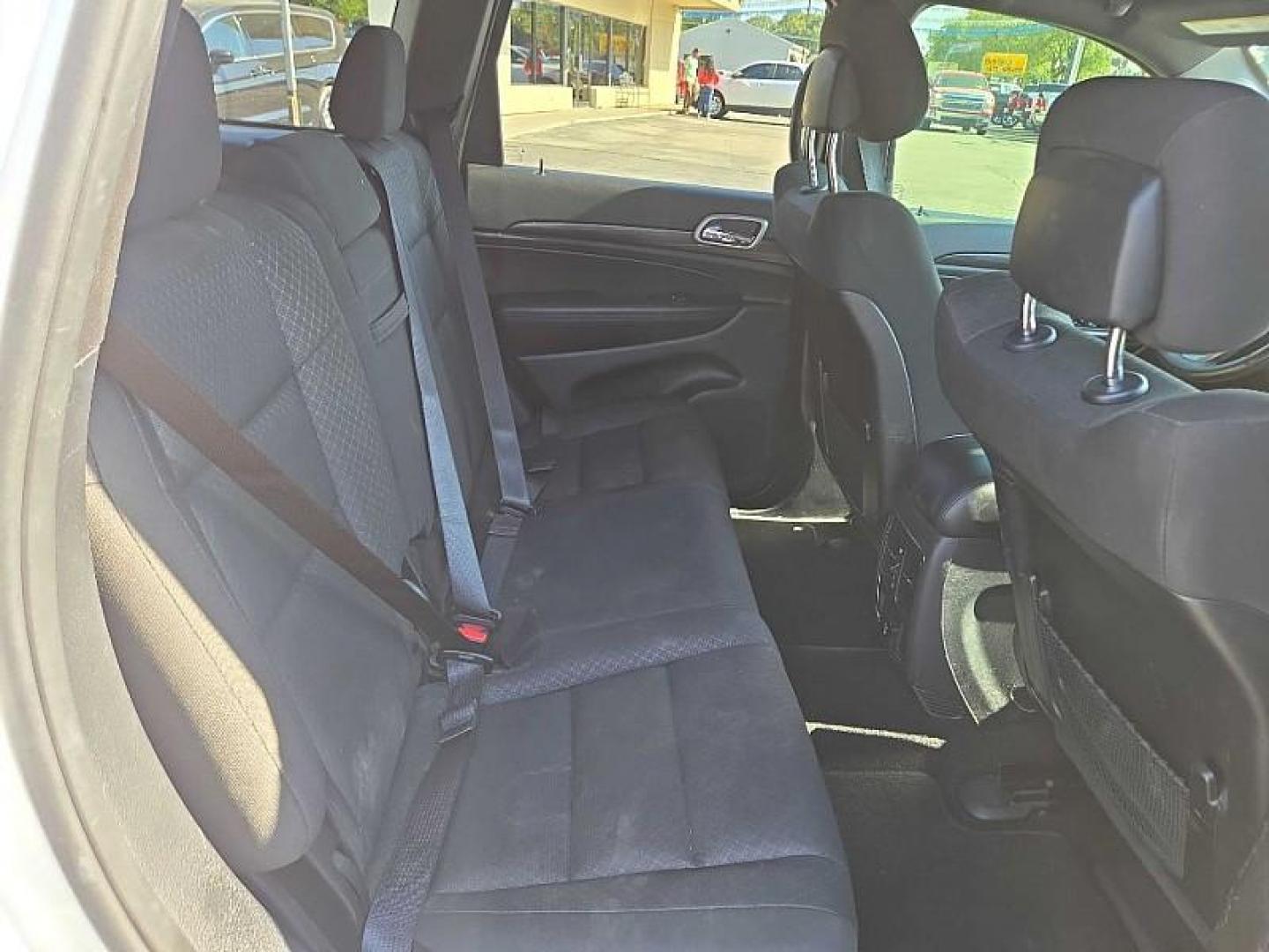 2020 WHITE /BLACK Jeep Grand Cherokee Laredo 4WD (1C4RJFAG9LC) with an 3.6L V6 DOHC 24V engine, 8A transmission, located at 3304 Woodville Road, Northwood, OH, 43619, (419) 210-8019, 41.612694, -83.480743 - Your #1 Destination for Auto Loans and mdash;No Matter Your Credit!At our dealership, we believe everyone deserves the opportunity to drive their dream car and mdash;whether you have good credit, bad credit, or no credit at all. With a wide selection of hundreds of cars, trucks, and SUVs, you'll fin - Photo#14