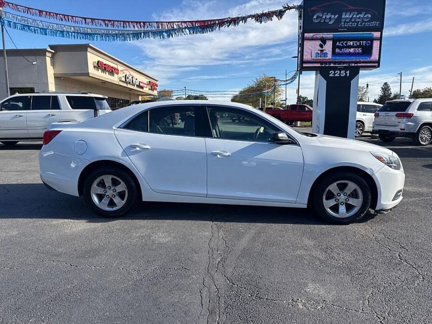 2013 WHITE /GRAY Chevrolet Malibu LS (1G11B5SA1DF) with an 2.5L L4 DOHC 16V engine, 6-Speed Automatic transmission, located at 3304 Woodville Road, Northwood, OH, 43619, (419) 210-8019, 41.612694, -83.480743 - Your #1 Destination for Auto Loans and mdash;No Matter Your Credit!At our dealership, we believe everyone deserves the opportunity to drive their dream car and mdash;whether you have good credit, bad credit, or no credit at all. With a wide selection of hundreds of cars, trucks, and SUVs, you'll fin - Photo#5