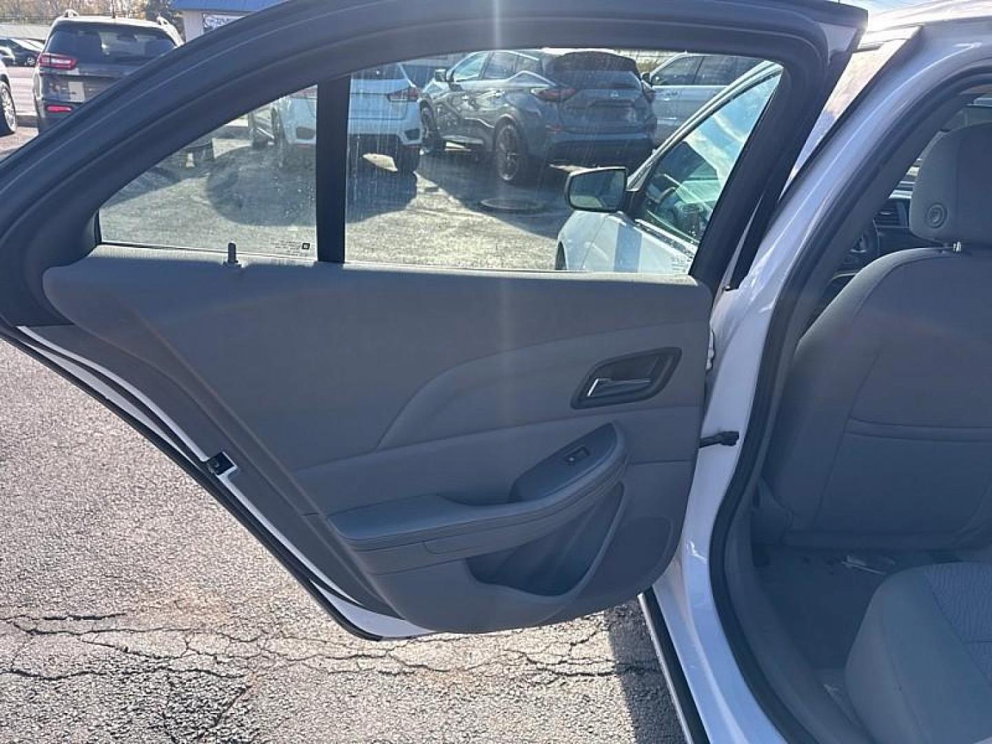 2013 WHITE /GRAY Chevrolet Malibu LS (1G11B5SA1DF) with an 2.5L L4 DOHC 16V engine, 6-Speed Automatic transmission, located at 3304 Woodville Road, Northwood, OH, 43619, (419) 210-8019, 41.612694, -83.480743 - Your #1 Destination for Auto Loans and mdash;No Matter Your Credit!At our dealership, we believe everyone deserves the opportunity to drive their dream car and mdash;whether you have good credit, bad credit, or no credit at all. With a wide selection of hundreds of cars, trucks, and SUVs, you'll fin - Photo#10