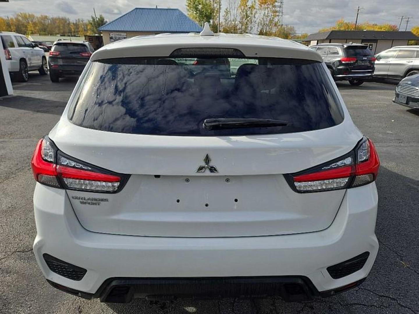 2020 WHITE /BLACK Mitsubishi Outlander Sport 2.0 ES CVT (JA4AP3AU8LU) with an 2.0L L4 DOHC 16V engine, CVT transmission, located at 3304 Woodville Road, Northwood, OH, 43619, (419) 210-8019, 41.612694, -83.480743 - Your #1 Destination for Auto Loans and mdash;No Matter Your Credit!At our dealership, we believe everyone deserves the opportunity to drive their dream car and mdash;whether you have good credit, bad credit, or no credit at all. With a wide selection of hundreds of cars, trucks, and SUVs, you'll fin - Photo#3