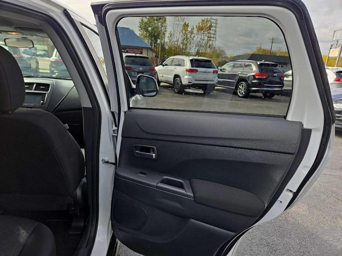 2020 WHITE /BLACK Mitsubishi Outlander Sport 2.0 ES CVT (JA4AP3AU8LU) with an 2.0L L4 DOHC 16V engine, CVT transmission, located at 3304 Woodville Road, Northwood, OH, 43619, (419) 210-8019, 41.612694, -83.480743 - Your #1 Destination for Auto Loans and mdash;No Matter Your Credit!At our dealership, we believe everyone deserves the opportunity to drive their dream car and mdash;whether you have good credit, bad credit, or no credit at all. With a wide selection of hundreds of cars, trucks, and SUVs, you'll fin - Photo#13