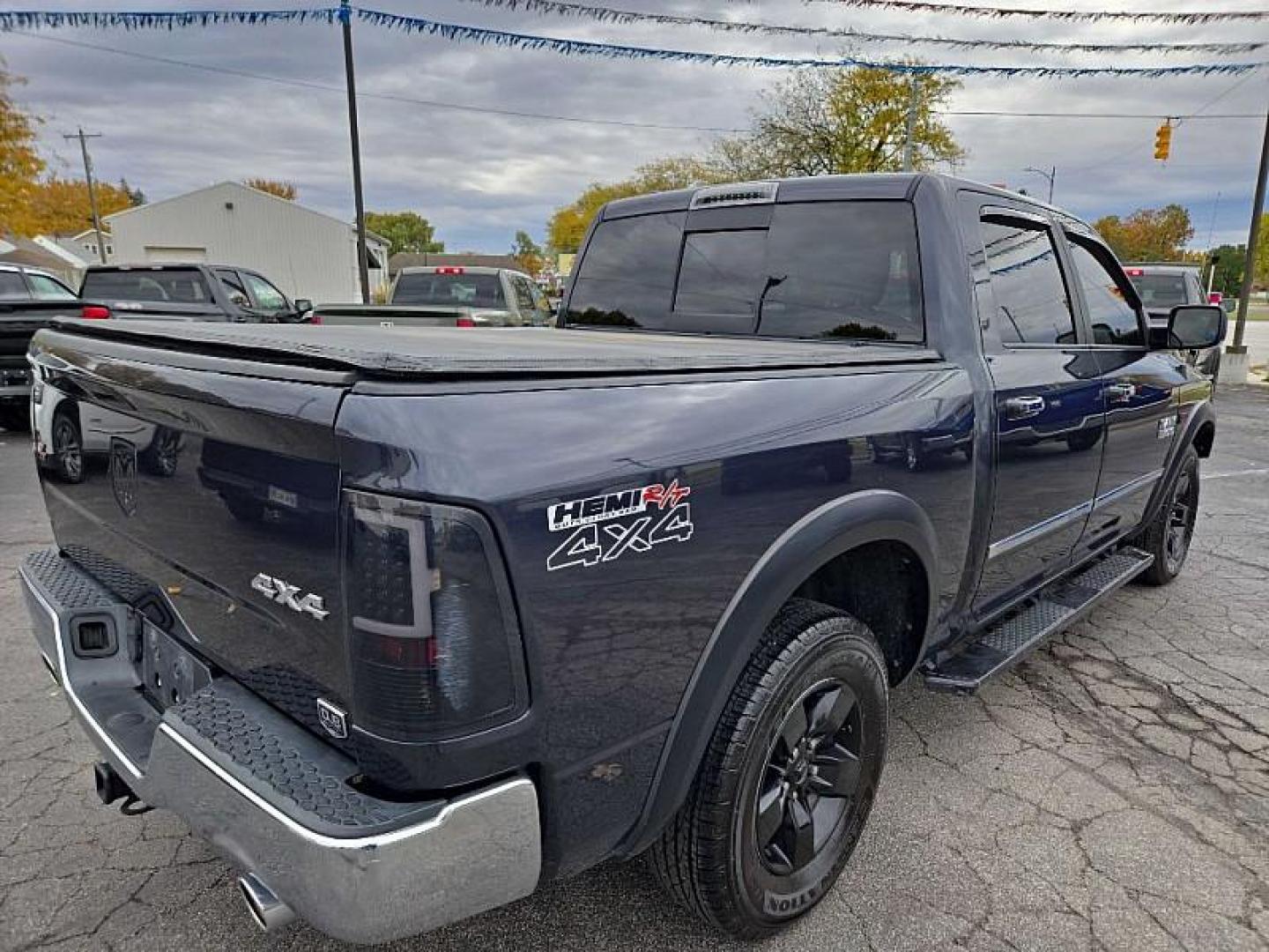 2016 GRAY /BLACK RAM 1500 SLT Crew Cab SWB 4WD (1C6RR7LT0GS) with an 5.7L V8 OHV 16V engine, 6A transmission, located at 3304 Woodville Road, Northwood, OH, 43619, (419) 210-8019, 41.612694, -83.480743 - Your #1 Destination for Auto Loans and mdash;No Matter Your Credit!At our dealership, we believe everyone deserves the opportunity to drive their dream car and mdash;whether you have good credit, bad credit, or no credit at all. With a wide selection of hundreds of cars, trucks, and SUVs, you'll fin - Photo#4