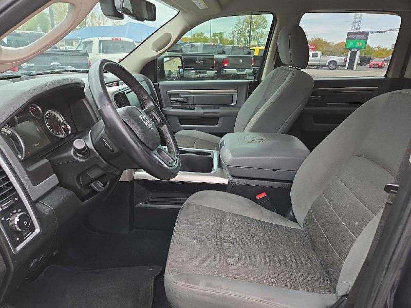 2016 GRAY /BLACK RAM 1500 SLT Crew Cab SWB 4WD (1C6RR7LT0GS) with an 5.7L V8 OHV 16V engine, 6A transmission, located at 3304 Woodville Road, Northwood, OH, 43619, (419) 210-8019, 41.612694, -83.480743 - Your #1 Destination for Auto Loans and mdash;No Matter Your Credit!At our dealership, we believe everyone deserves the opportunity to drive their dream car and mdash;whether you have good credit, bad credit, or no credit at all. With a wide selection of hundreds of cars, trucks, and SUVs, you'll fin - Photo#9