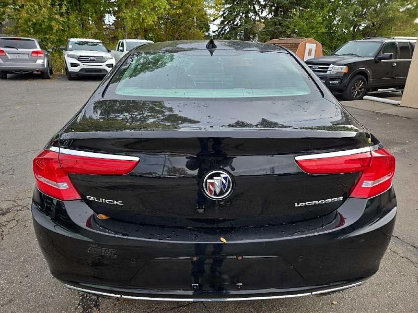 2017 BLACK /BLACK Buick LaCrosse Premium (1G4ZR5SS1HU) with an 3.6L V6 DOHC 24V engine, 8A transmission, located at 3304 Woodville Road, Northwood, OH, 43619, (419) 210-8019, 41.612694, -83.480743 - Photo#3