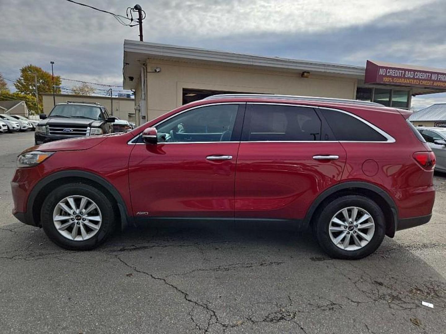 2019 RED /BLACK Kia Sorento LX AWD (5XYPGDA30KG) with an 2.4L L4 DOHC 16V engine, 6A transmission, located at 3304 Woodville Road, Northwood, OH, 43619, (419) 210-8019, 41.612694, -83.480743 - Photo#1
