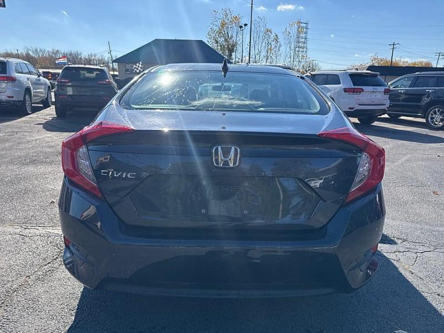 2018 GRAY /BLACK Honda Civic EX Sedan CVT (2HGFC2F71JH) with an 2.0L L4 DOHC 16V engine, CVT transmission, located at 3304 Woodville Road, Northwood, OH, 43619, (419) 210-8019, 41.612694, -83.480743 - Your #1 Destination for Auto Loans and mdash;No Matter Your Credit!At our dealership, we believe everyone deserves the opportunity to drive their dream car and mdash;whether you have good credit, bad credit, or no credit at all. With a wide selection of hundreds of cars, trucks, and SUVs, you'll fin - Photo#3