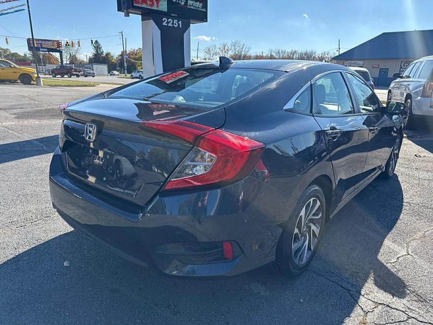 2018 GRAY /BLACK Honda Civic EX Sedan CVT (2HGFC2F71JH) with an 2.0L L4 DOHC 16V engine, CVT transmission, located at 3304 Woodville Road, Northwood, OH, 43619, (419) 210-8019, 41.612694, -83.480743 - Your #1 Destination for Auto Loans and mdash;No Matter Your Credit!At our dealership, we believe everyone deserves the opportunity to drive their dream car and mdash;whether you have good credit, bad credit, or no credit at all. With a wide selection of hundreds of cars, trucks, and SUVs, you'll fin - Photo#4