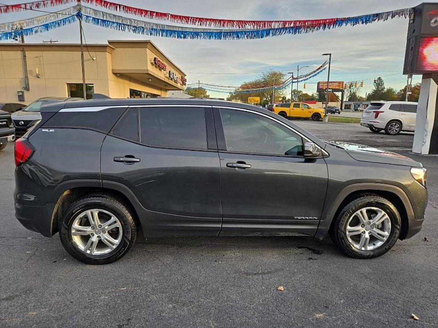 2020 GRAY /BLACK GMC Terrain SLE (3GKALMEV8LL) with an 1.4L L4 DOHC 16V TURBO engine, 6A transmission, located at 3304 Woodville Road, Northwood, OH, 43619, (419) 210-8019, 41.612694, -83.480743 - Your #1 Destination for Auto Loans and mdash;No Matter Your Credit!At our dealership, we believe everyone deserves the opportunity to drive their dream car and mdash;whether you have good credit, bad credit, or no credit at all. With a wide selection of hundreds of cars, trucks, and SUVs, you'll fin - Photo#5