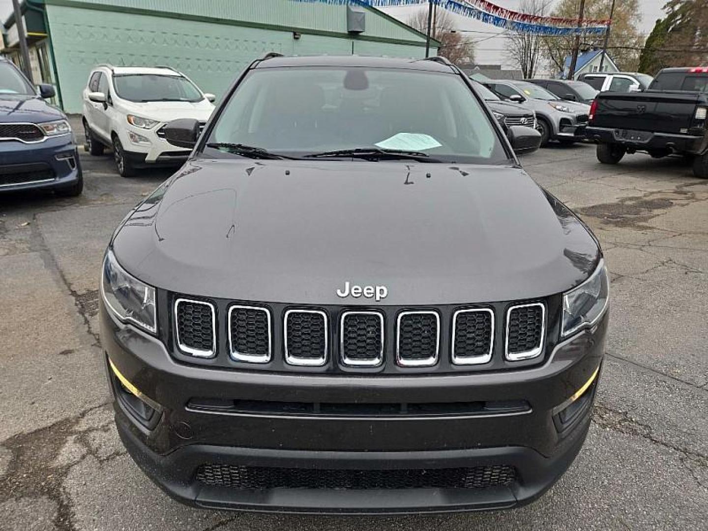 2020 GRAY /BLACK Jeep Compass Latitude 4WD (3C4NJDBB9LT) with an 2.4L L4 DOHC 16V engine, Automatic 9-Spd transmission, located at 3304 Woodville Road, Northwood, OH, 43619, (419) 210-8019, 41.612694, -83.480743 - Your #1 Destination for Auto Loans and mdash;No Matter Your Credit!At our dealership, we believe everyone deserves the opportunity to drive their dream car and mdash;whether you have good credit, bad credit, or no credit at all. With a wide selection of hundreds of cars, trucks, and SUVs, you'll fin - Photo#7