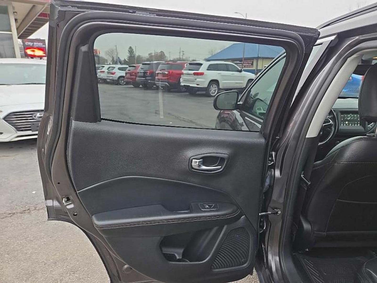 2020 GRAY /BLACK Jeep Compass Latitude 4WD (3C4NJDBB9LT) with an 2.4L L4 DOHC 16V engine, Automatic 9-Spd transmission, located at 3304 Woodville Road, Northwood, OH, 43619, (419) 210-8019, 41.612694, -83.480743 - Your #1 Destination for Auto Loans and mdash;No Matter Your Credit!At our dealership, we believe everyone deserves the opportunity to drive their dream car and mdash;whether you have good credit, bad credit, or no credit at all. With a wide selection of hundreds of cars, trucks, and SUVs, you'll fin - Photo#10