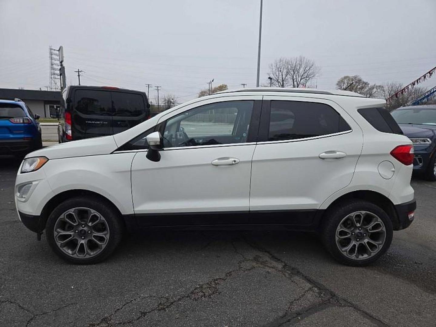 2019 WHITE /BLACK Ford EcoSport Titanium AWD (MAJ6S3KL7KC) with an 2.0L L4 DOHC 16V engine, 6A transmission, located at 3304 Woodville Road, Northwood, OH, 43619, (419) 210-8019, 41.612694, -83.480743 - Your #1 Destination for Auto Loans and mdash;No Matter Your Credit!At our dealership, we believe everyone deserves the opportunity to drive their dream car and mdash;whether you have good credit, bad credit, or no credit at all. With a wide selection of hundreds of cars, trucks, and SUVs, you'll fin - Photo#1